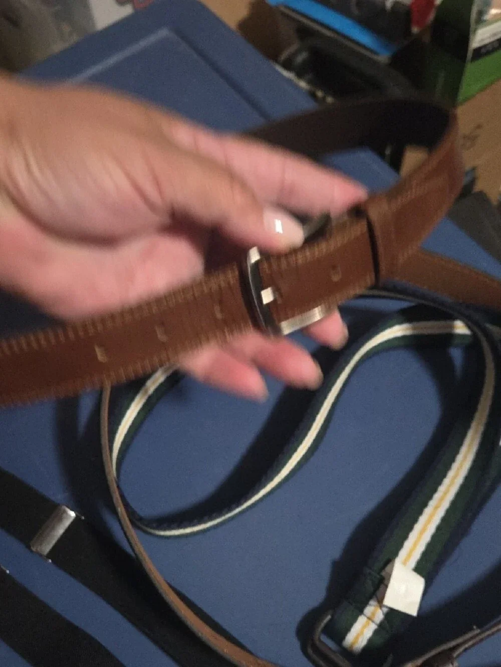 3 Belts.  2 Brown Boys Belts, A Canvas Polo Belt And Black Suspenders.